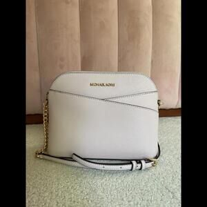 Michael Kors Jet Set Travel Medium Dome Crossbody Bag in Pink